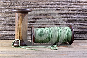 Wooden Bobbins with yarn