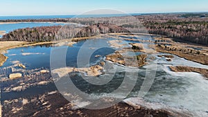 Wooden Bords Trail Through the Kaniera Lake Reeds Aerial Spring Shot Lapmezciems, Latvia.