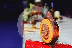 Wooden bottle with national symbols graven on wood traditional