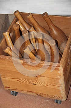 Wooden bottles in a box photo