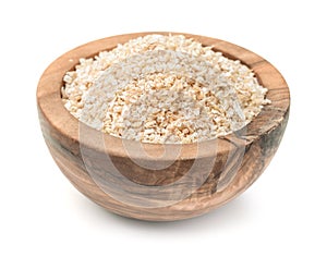 Wooden bowl of barley grits