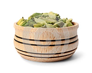 Wooden bowl with cardamon