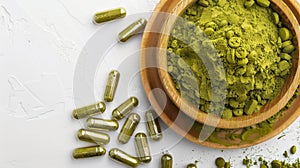 Wooden Bowl Filled With Green Powder and Capsules