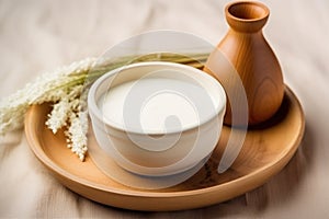 wooden bowl with frothing milk for skin treatment