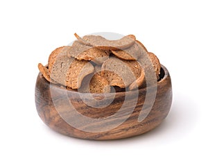 Wooden bowl of rye bread chips