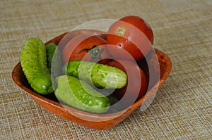 Wooden bowl with vegetables