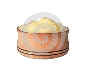 Wooden bowl of yellow body scrub isolated on white