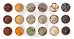 Wooden bowls with different spices and herbs on white background, top view.