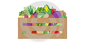 Wooden box filled with assorted fresh vegetables
