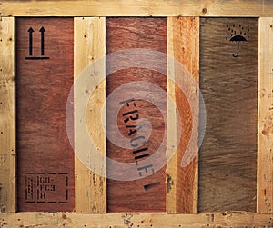 Wooden box with fragile and freight signs