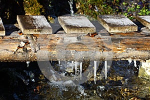 Wooden bridge across the creek