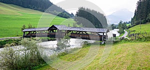 Wooden bridge for cyclists over a river