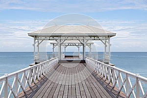 wooden bridge go to pavilion on the sea, beautiful beach on sunny day in Thailand