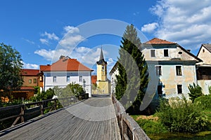 Wooden bridge leading to Kostanjevica na Krki in Dolenjska, Slovenia photo