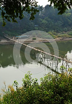 Wooden bridge with Mekong River