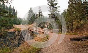 Wooden Bridge over Meadow Creek Gorge for hiking and horseback packing trail in the Bob Marshall Wilderness area in Montana USA