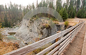 Wooden Bridge over Meadow Creek Gorge for hiking and horseback packing trail in the Bob Marshall Wilderness area in Montana USA