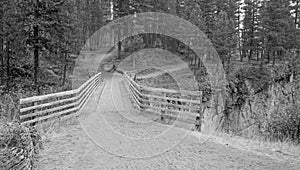 Wooden Bridge over Meadow Creek Gorge for hiking and horseback packing trail in the Bob Marshall Wilderness complex Montana