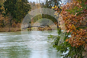 Wooden bridge over pond in Abramtsevo Museum-Reserve, Moscow Region, Russia