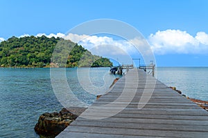 Wooden bridge over sea and blue sky on tropical beach on Koh Kood island Trad in Thailand