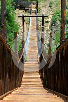 Wooden bridge in park photo