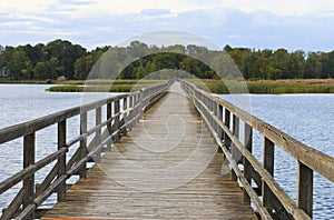 Wooden bridge for pedestrians on Sirvenos Lake.