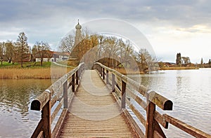 Wooden bridge in pictorial landscape