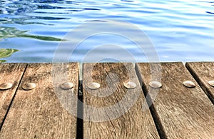 Wooden Bridge in a river of Pirineos photo