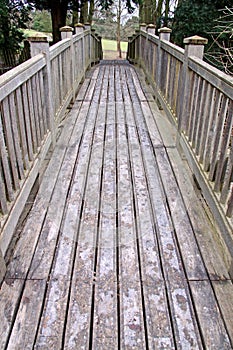Wooden bridge into rural countryside