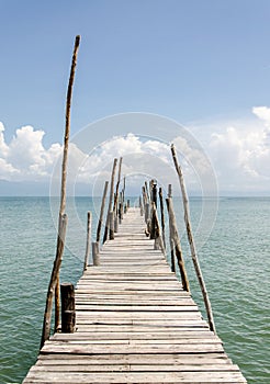 The wooden bridge and sea in holiday