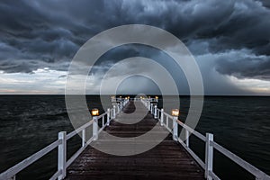 Wooden bridge into the sea