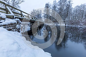 Wooden bridge during a snowy winter, Sweden