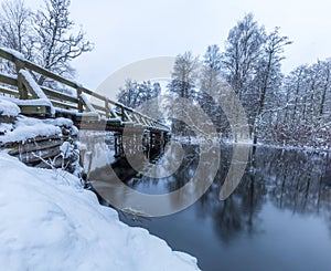 Wooden bridge during a snowy winter, Sweden