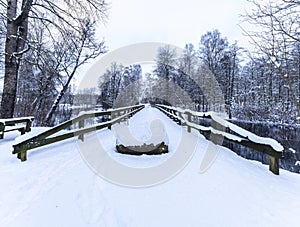 Wooden bridge during a snowy winter, Sweden