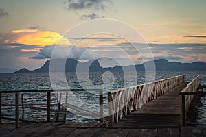 Wooden bridge during the sunrise near the Bum bum island in Semporna, Borneo Sabah