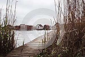 Wooden bridges on the Lake Bokod. Fishing wooden cottages, Hungary