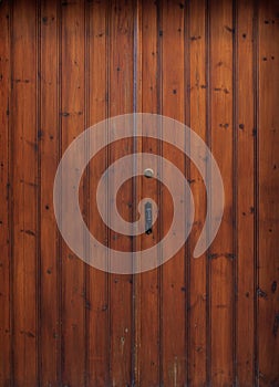 Wooden brown, aged doorway, latch and padlock.Backdrop, closeup, detail