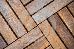 Wooden brown planks on the floor as a deatiled background pattern
