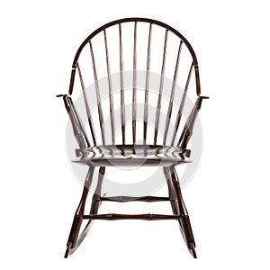 Wooden brown rocking chair made of antique on a white background