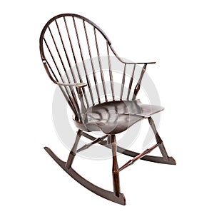 Wooden brown rocking chair made of antique on a white background