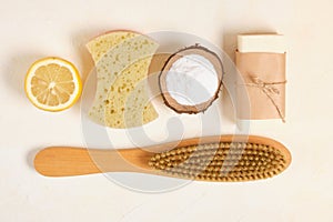 Wooden brush, lemon, soap,luffa and baking soda for eco cleaning zero waste lifestyle concept