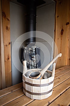 wooden bucket with a bucket in the Russian bath