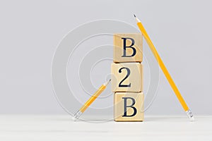 Wooden building blocks with the abbreviation acronym B2B