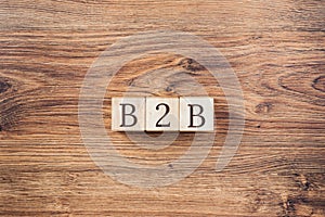 Wooden building blocks with the abbreviation B2B