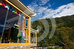 Wooden building with hill in autumn