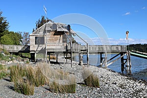 Wooden building on shore Lake Te Anau New Zealand