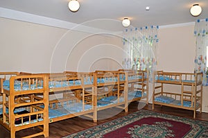 Wooden bunk beds for children in the kindergarten