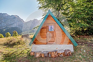 Wooden Cabin in the woods in autumn by the mountain Zelengora, B