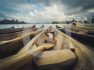 Wooden canoe boats, traditional wood boat closeup -