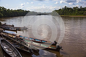 Wooden canoe in river port